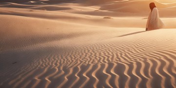 咽过沙浪子回头究竟是哪首歌？